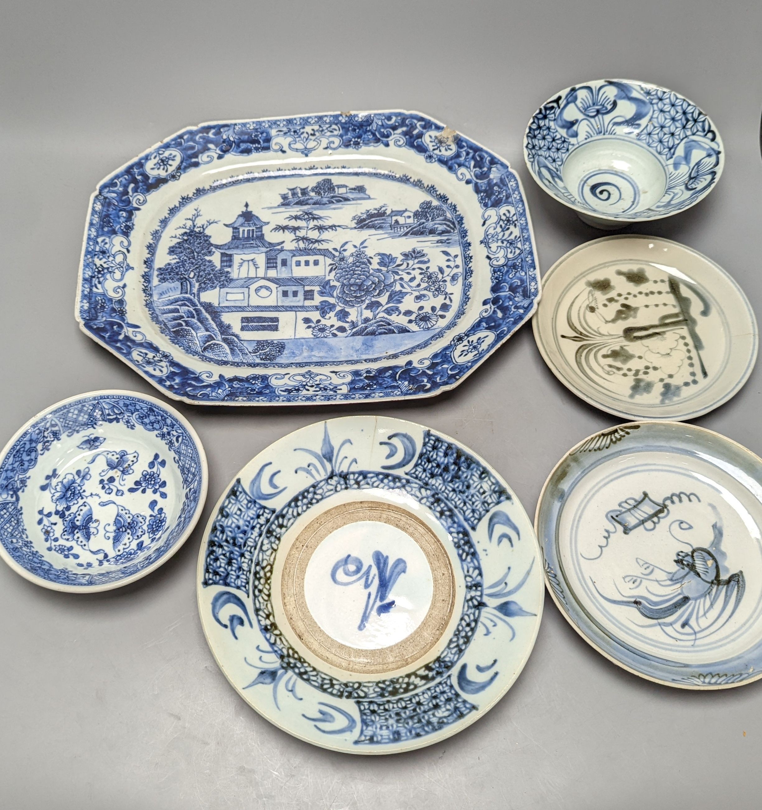 An 18th century Chinese export blue and white meat platter, 38 cms wide, and other Oriental tableware (6)
